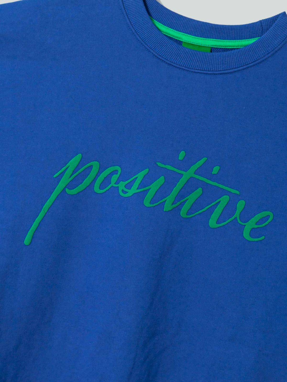 【POSITIVE】“SLEEVE FLOWER”スウェットトレーナー