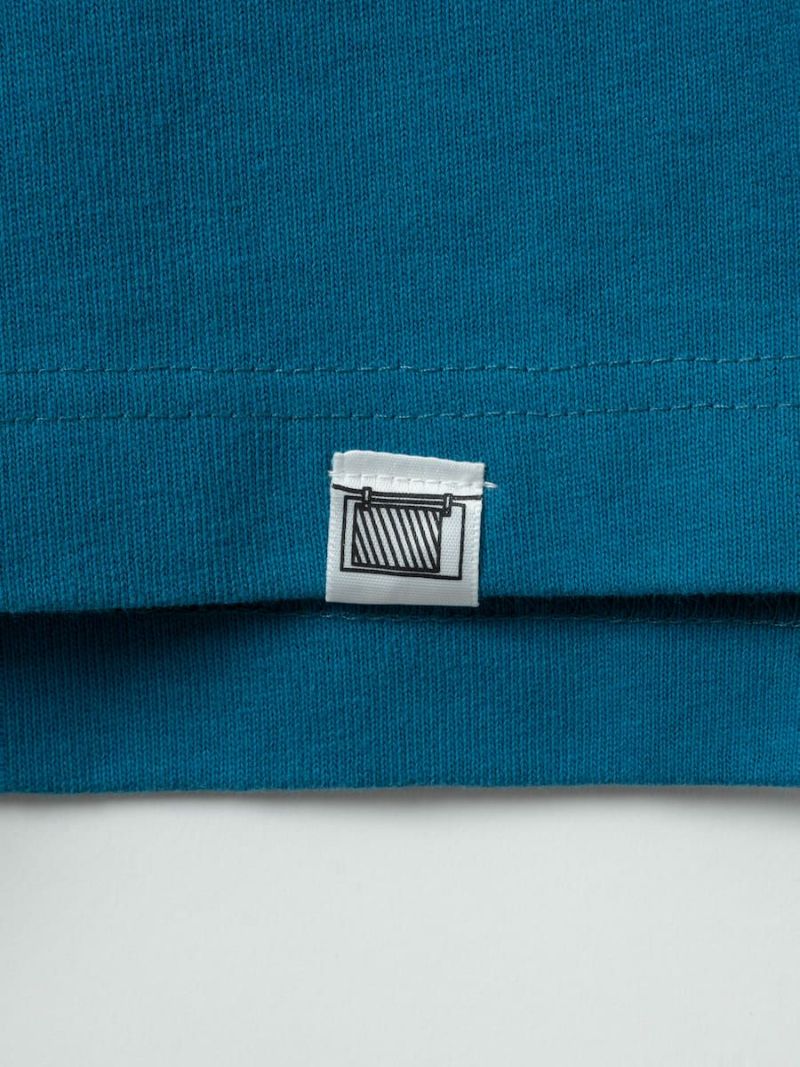 【allCaJoule】ロゴプリントラガーシャツ